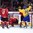 HELSINKI, FINLAND - DECEMBER 26: Sweden's Oskar Lindblom #23 celebrates with Axel Holmstrom #25 after scoring Team Sweden's second goal of the game during preliminary round action at the 2016 IIHF World Junior Championship. (Photo by Matt Zambonin/HHOF-IIHF Images)
